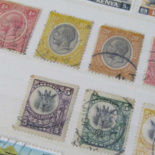 Album with over 1000 stamps - Ascension, Basutoland, Lesotho, Botswana and more