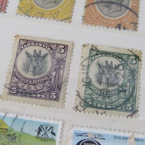Album with over 1000 stamps - Ascension, Basutoland, Lesotho, Botswana and more