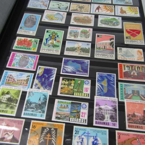 Stamp Album with over 1100 stamps - mint and used - some very good sets with album