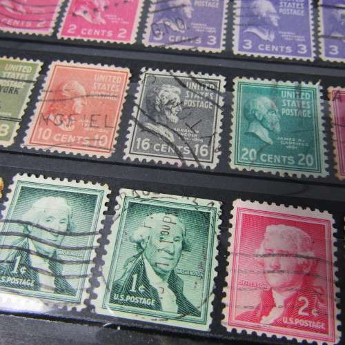 Stamp Album with over 1100 stamps - mint and used - some very good sets with album