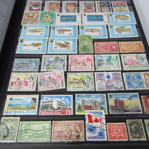 Stamp Album with over 1100 stamps - mint and used - some very good sets with album