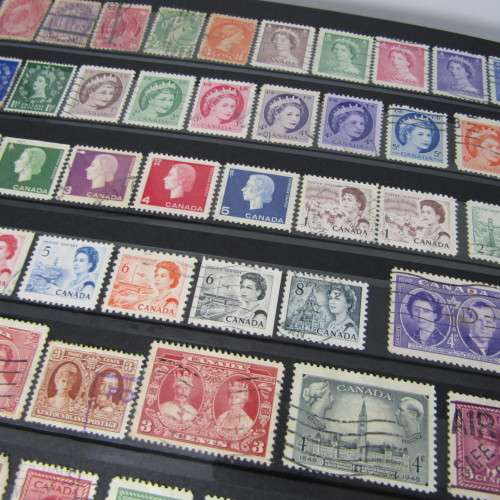 Stamp Album with over 1100 stamps - mint and used - some very good sets with album