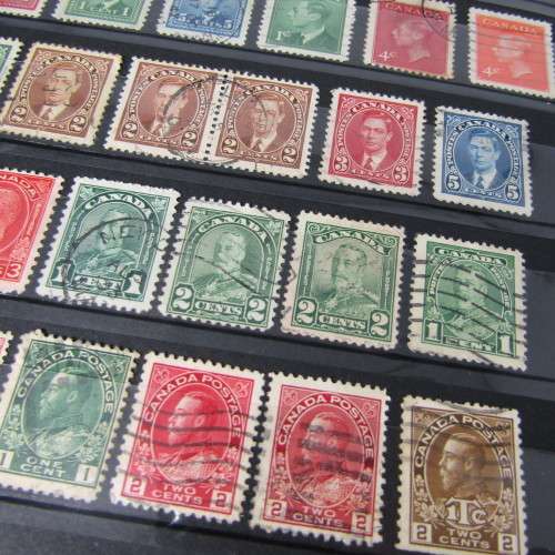 Stamp Album with over 1100 stamps - mint and used - some very good sets with album
