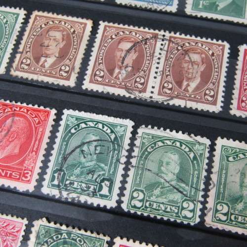 Stamp Album with over 1100 stamps - mint and used - some very good sets with album