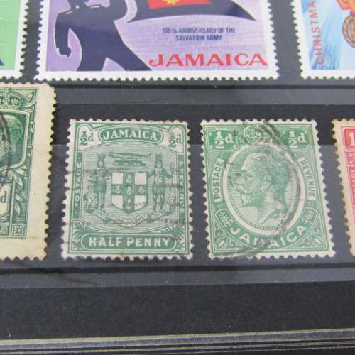 Stamp Album with over 1100 stamps - mint and used - some very good sets with album