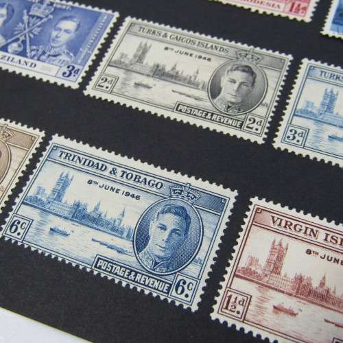 Lot of British commonwealth stamps - mint and used hinged