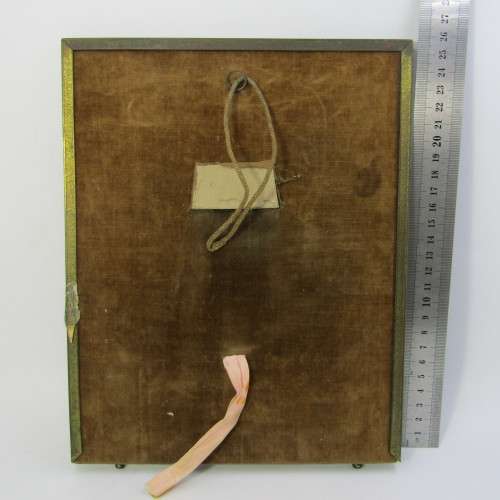 Vintage photo frame with antique coloured picture