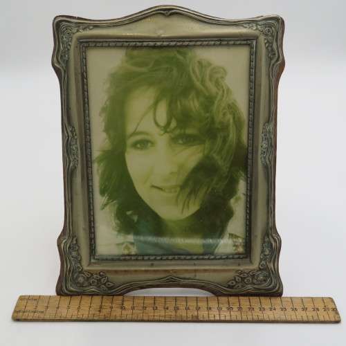 Antique EPNS frame on wooden backing