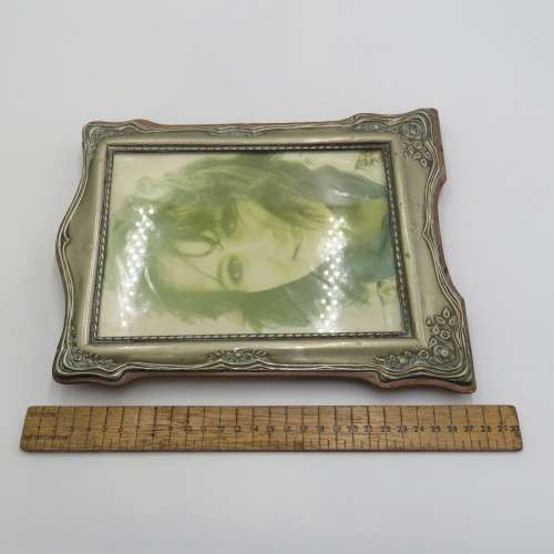 Antique EPNS frame on wooden backing