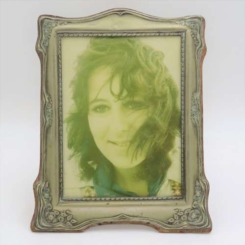 Antique EPNS frame on wooden backing