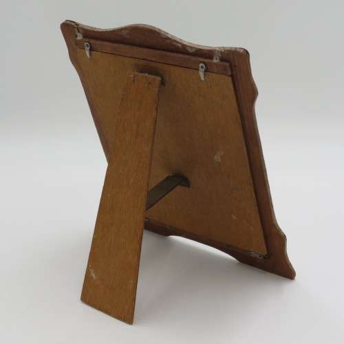 Antique EPNS frame on wooden backing