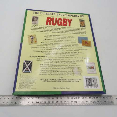 The ultimate encyclopedia of Rugby with blue bulls poster and Joost v/d Westhuizen