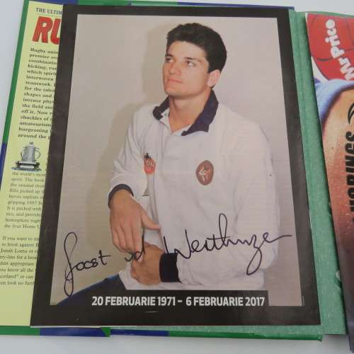 The ultimate encyclopedia of Rugby with blue bulls poster and Joost v/d Westhuizen