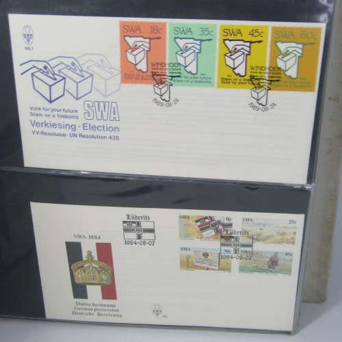 First Day Cover album with about 140 items South Africa and Africa