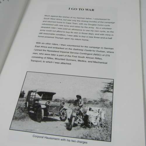 Corporal Haussmann goes to war - Armed with Motorcycle & camera by Colin Martin