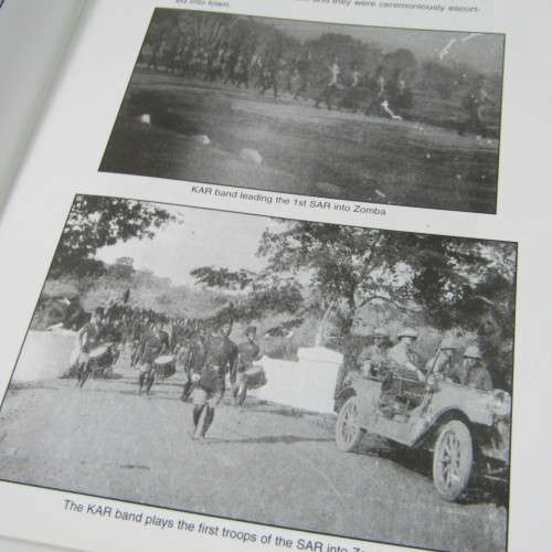Corporal Haussmann goes to war - Armed with Motorcycle & camera by Colin Martin