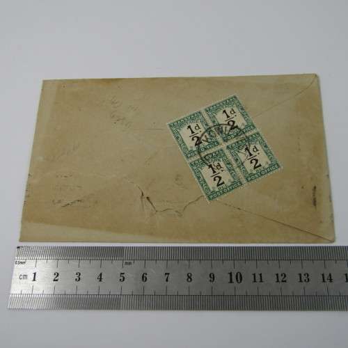 Block of 1/2d stamps on Australia cover with postage dues on reverse
