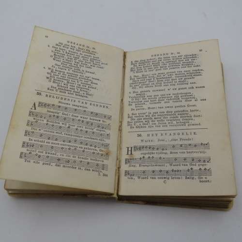 Pair of Psalmen and Gezangen 1918 booklets with faux ivory covers