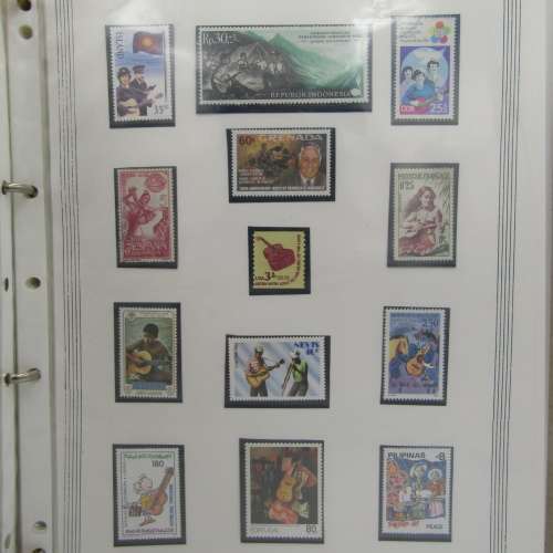 Album with Thematic collection Musical Instrument stamps 491 stamps in total