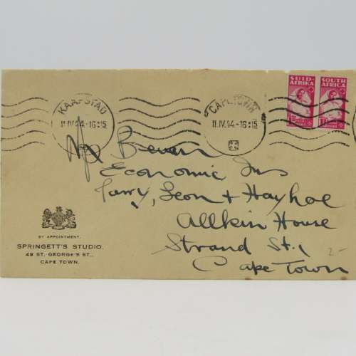 Letter sent from Cape Town to Strand on Springett`s studio stationery with 2 war stamps