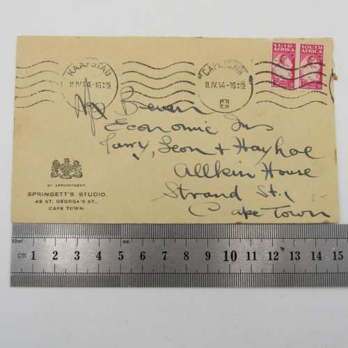 Letter sent from Cape Town to Strand on Springett`s studio stationery with 2 war stamps