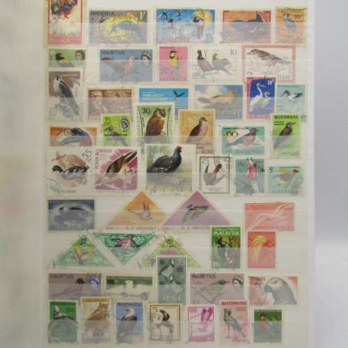 Thematic stamp album with the following Flowers/Birds/Fish/Ships and Aeroplanes