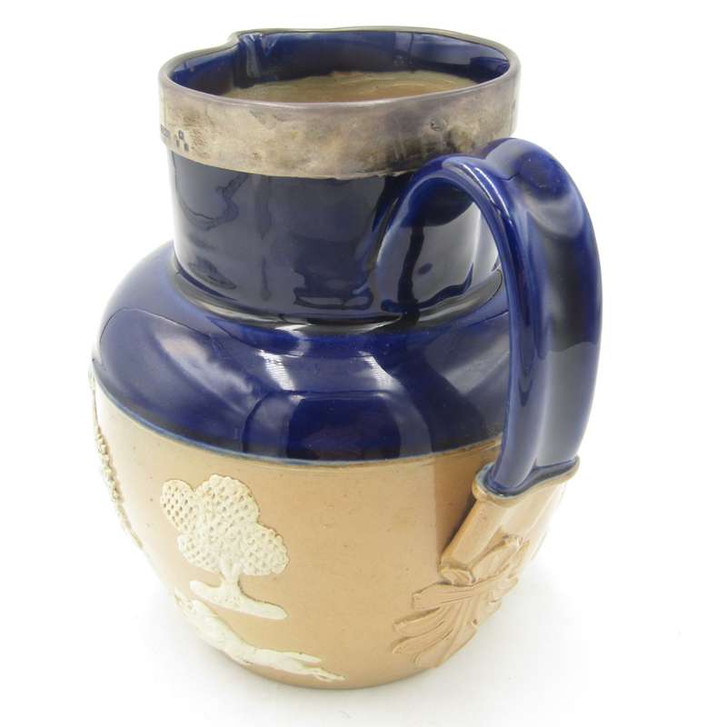 Antique Doulton Lambeth stoneware pitcher with hallmarked silver rim - hallmarked London 1898