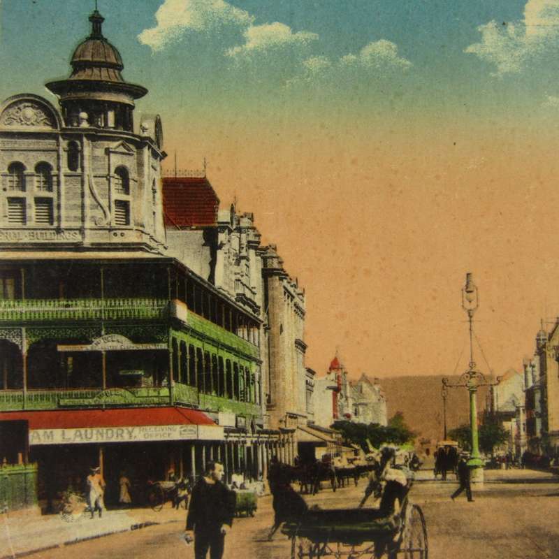 Antique color postcard of Smith Street Durban showing the Natal Bank