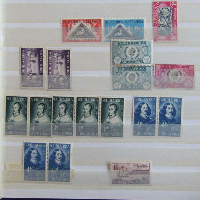 Stamp album with about 850 stamps - most in blocks or control blocks - some early ones