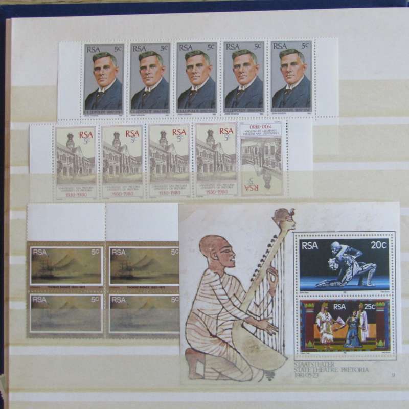 Stamp album with about 850 stamps - most in blocks or control blocks - some early ones