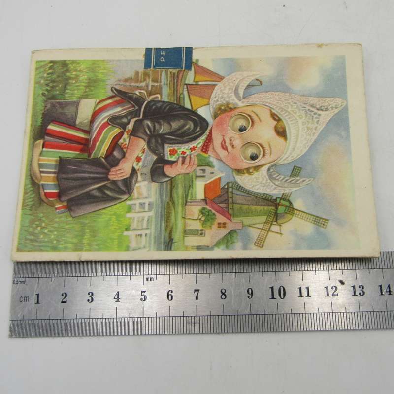 Vintage Dutch postcard with moveable eyes