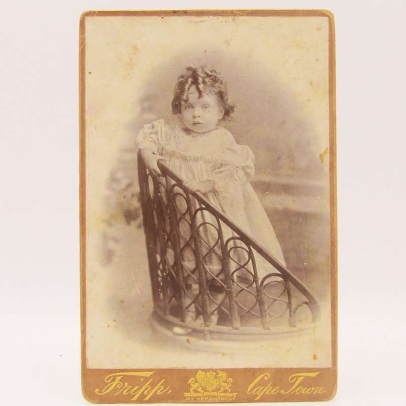 Antique photo of baby / young child standing on a chair taken by Tripp - Cape Town early 1900`s
