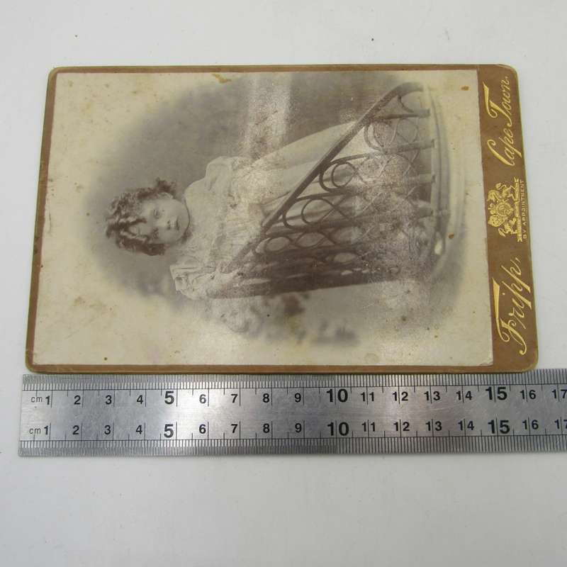 Antique photo of baby / young child standing on a chair taken by Tripp - Cape Town early 1900`s