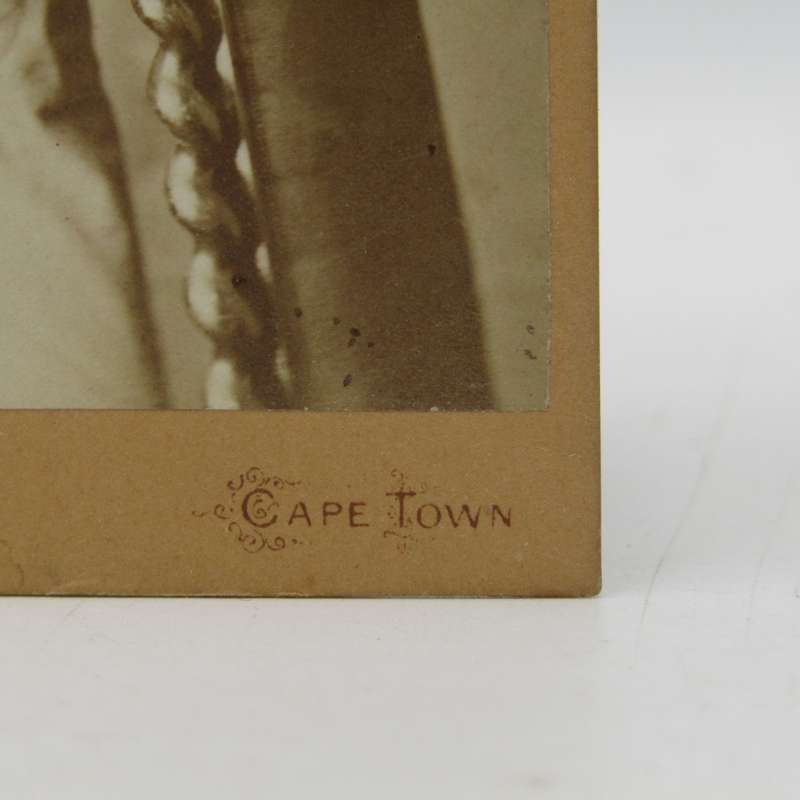 Turn of the century photo of a young man taken by SB Barnard of Cape Town