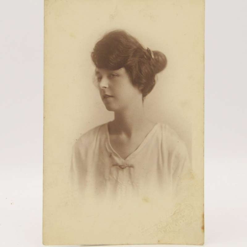 Antique photo postcard with photo of lady taken in Blackpool, England circalated 1920