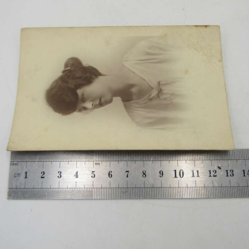 Antique photo postcard with photo of lady taken in Blackpool, England circalated 1920