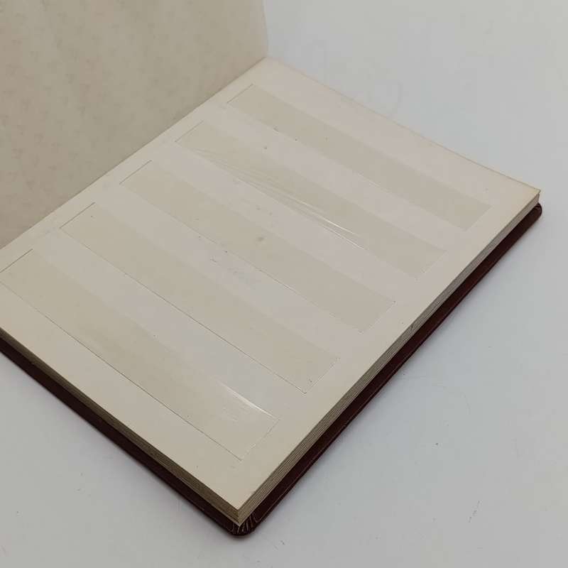Vintage stamp album with 14 pages - used