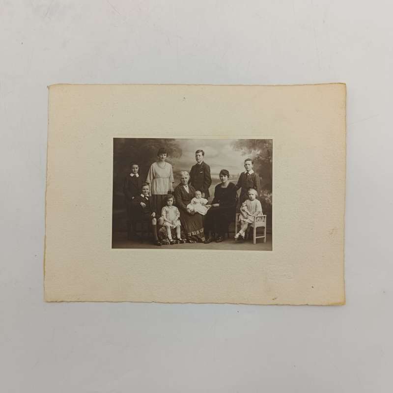 Antique Studio photo of Grandmother, mother and 8 children - note the doll set in Burnley area