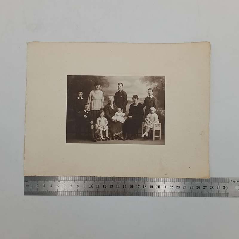 Antique Studio photo of Grandmother, mother and 8 children - note the doll set in Burnley area