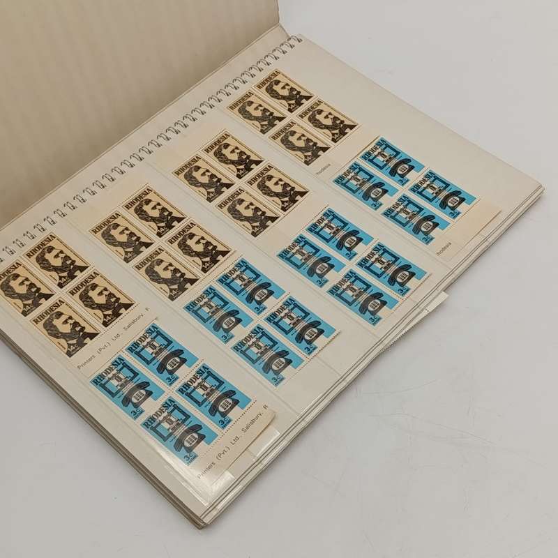 18 page Big 18 stamp album with over 640 Rhodesia mint stamps