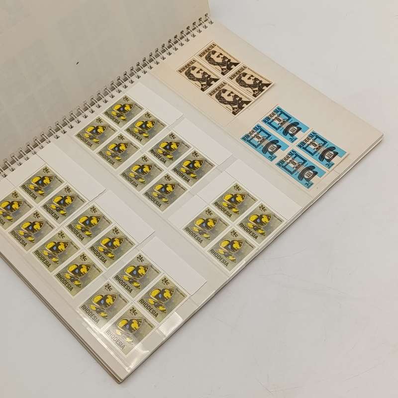 18 page Big 18 stamp album with over 640 Rhodesia mint stamps