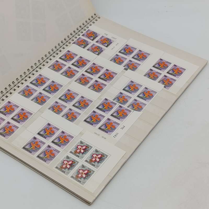 18 page Big 18 stamp album with over 640 Rhodesia mint stamps
