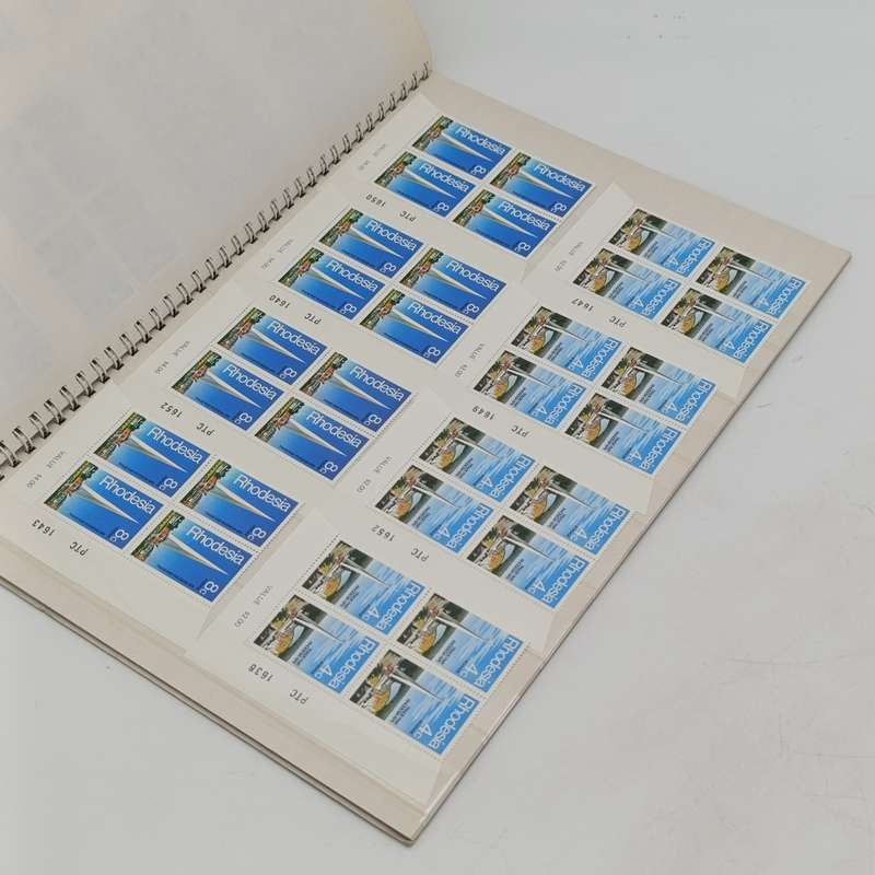18 page Big 18 stamp album with over 640 Rhodesia mint stamps