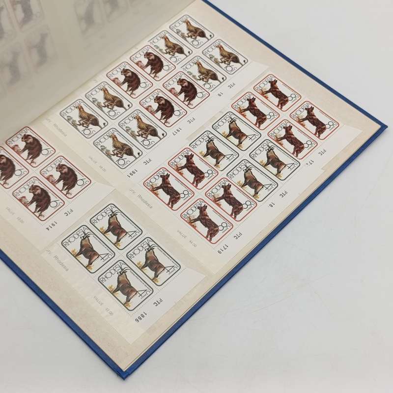 16 page excellent condition stamp album with over 500 Rhodesia mint stamps