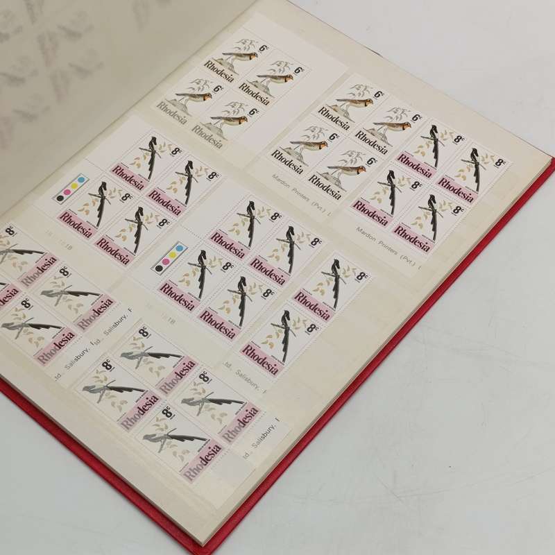 Excellent condition 16 page stamp album with 380 mint stamps and 120 mint Aloe stamps