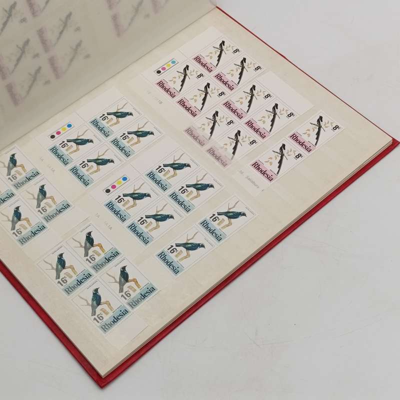 Excellent condition 16 page stamp album with 380 mint stamps and 120 mint Aloe stamps