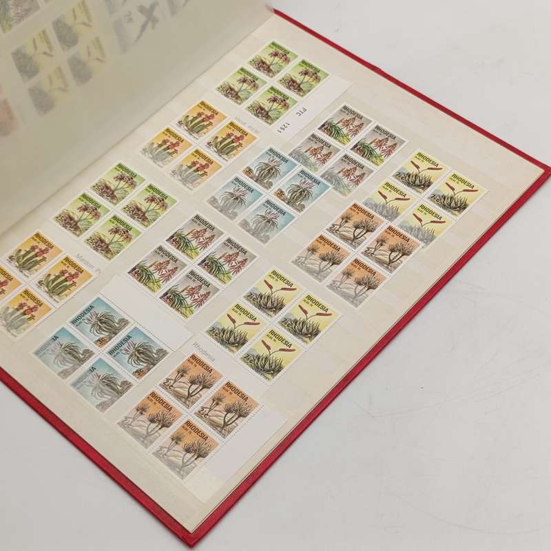 Excellent condition 16 page stamp album with 380 mint stamps and 120 mint Aloe stamps