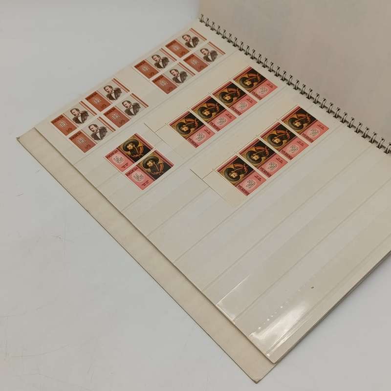 18 page album with well over 500 Rhodesia mint stamps and some used