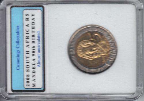 MANDELA 2008 BIRTHDAY COIN HOUSED IN PROTECTIVE HOLDER.