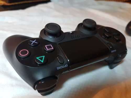 Playstation 4 1TB Console + 2 x Dualshock Controllers (plus 4 games)